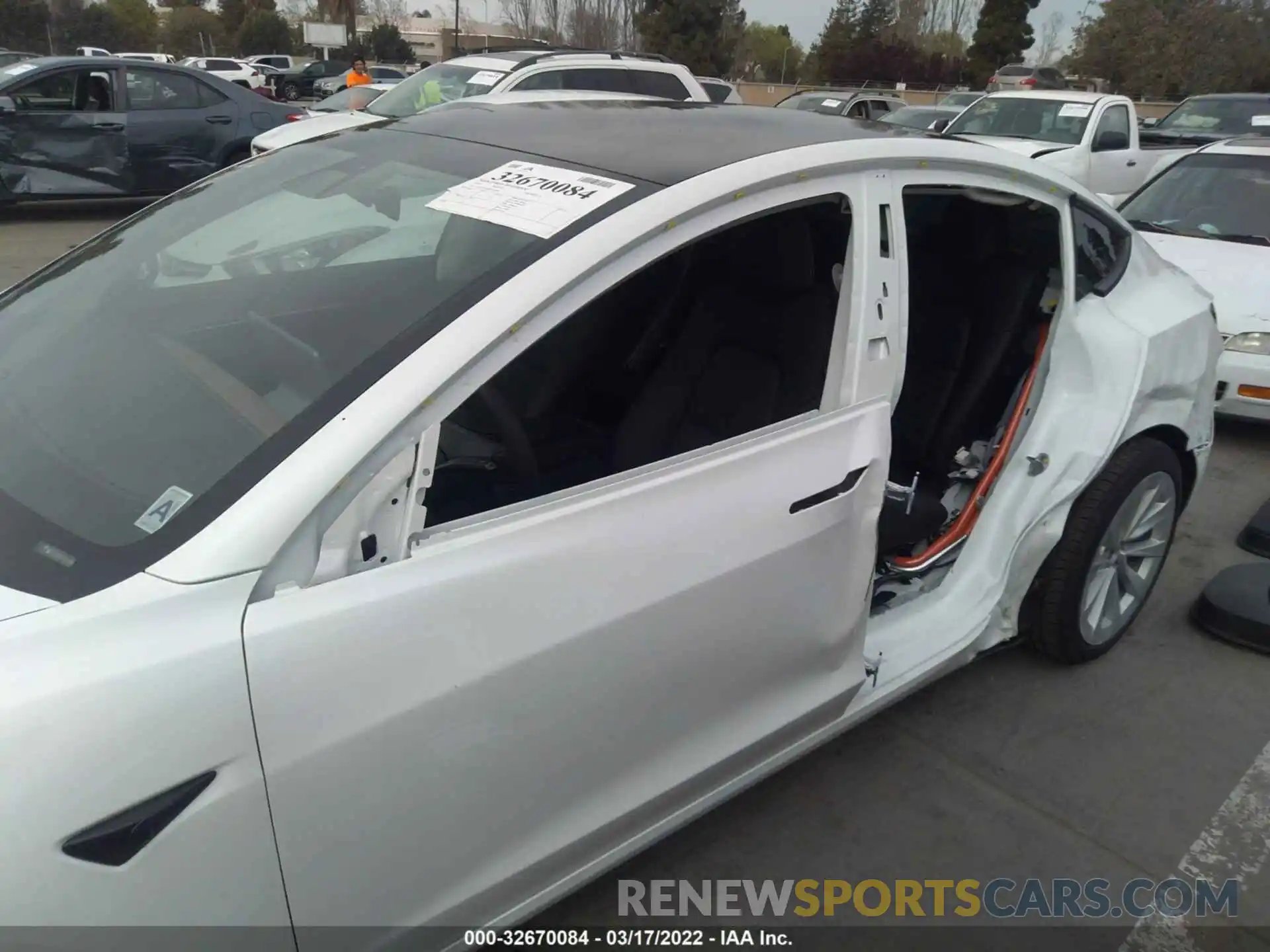 6 Photograph of a damaged car 5YJ3E1EBXNF128981 TESLA MODEL 3 2022