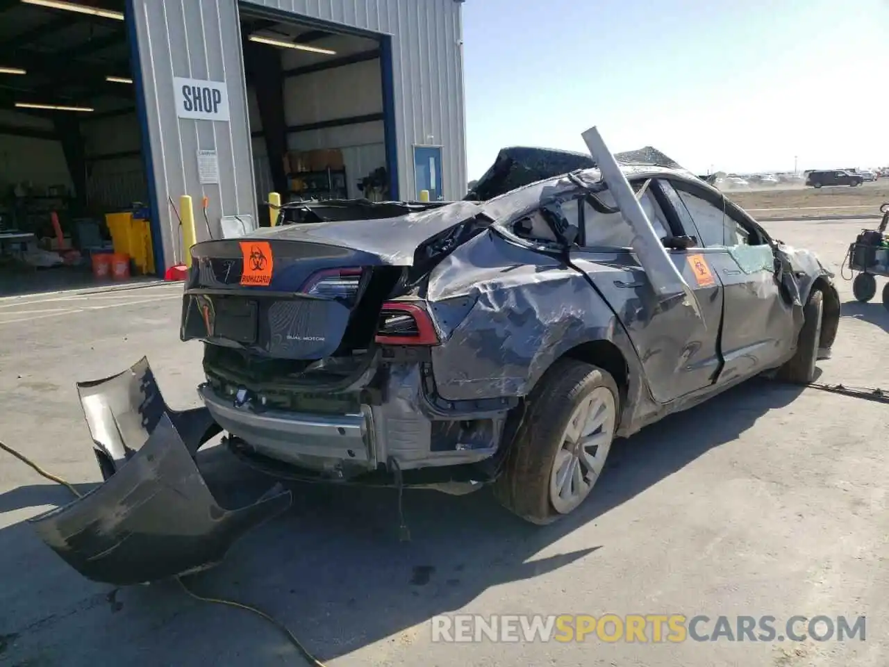 4 Photograph of a damaged car 5YJ3E1EBXNF129998 TESLA MODEL 3 2022