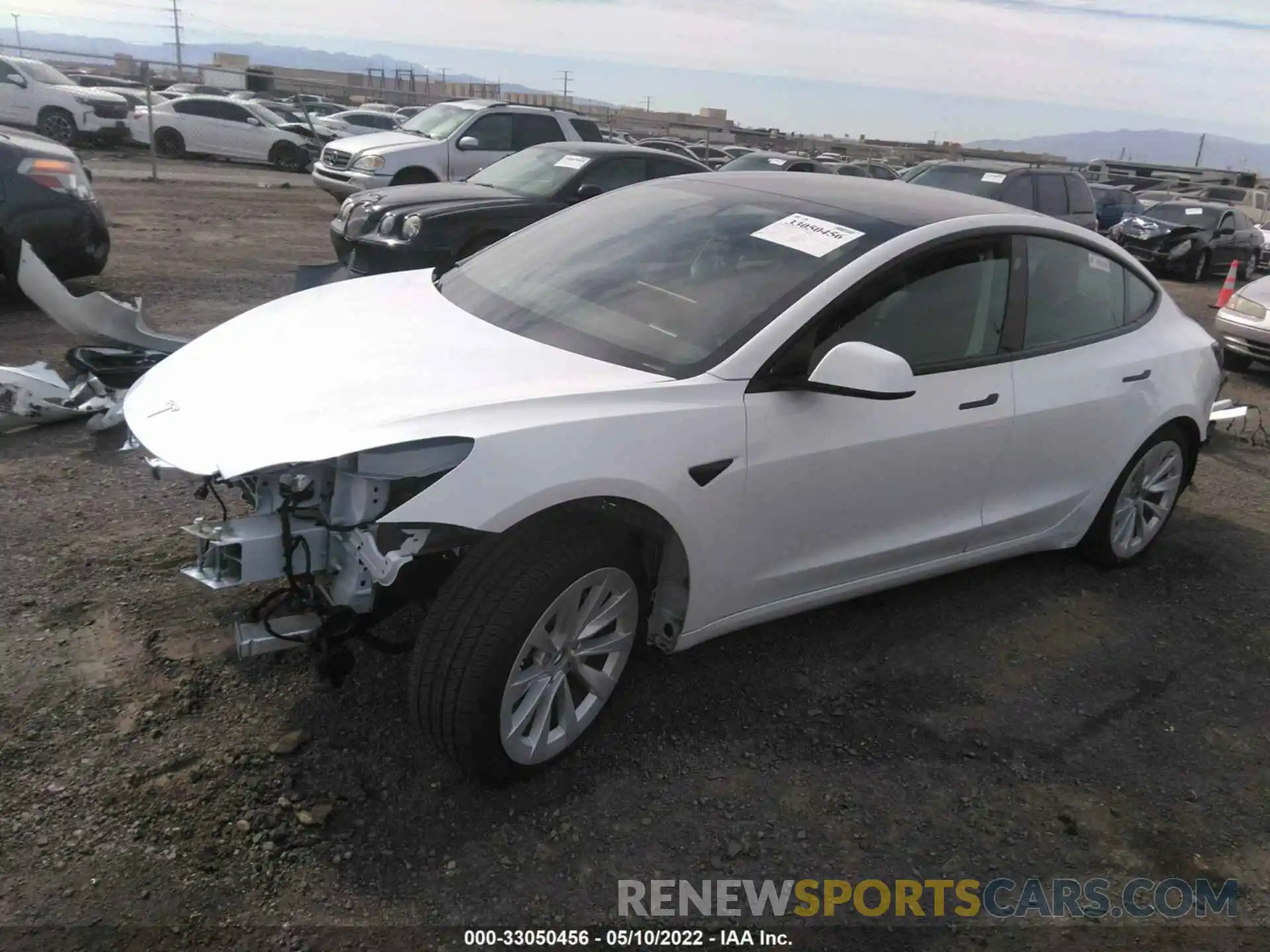 2 Photograph of a damaged car 5YJ3E1EBXNF134571 TESLA MODEL 3 2022