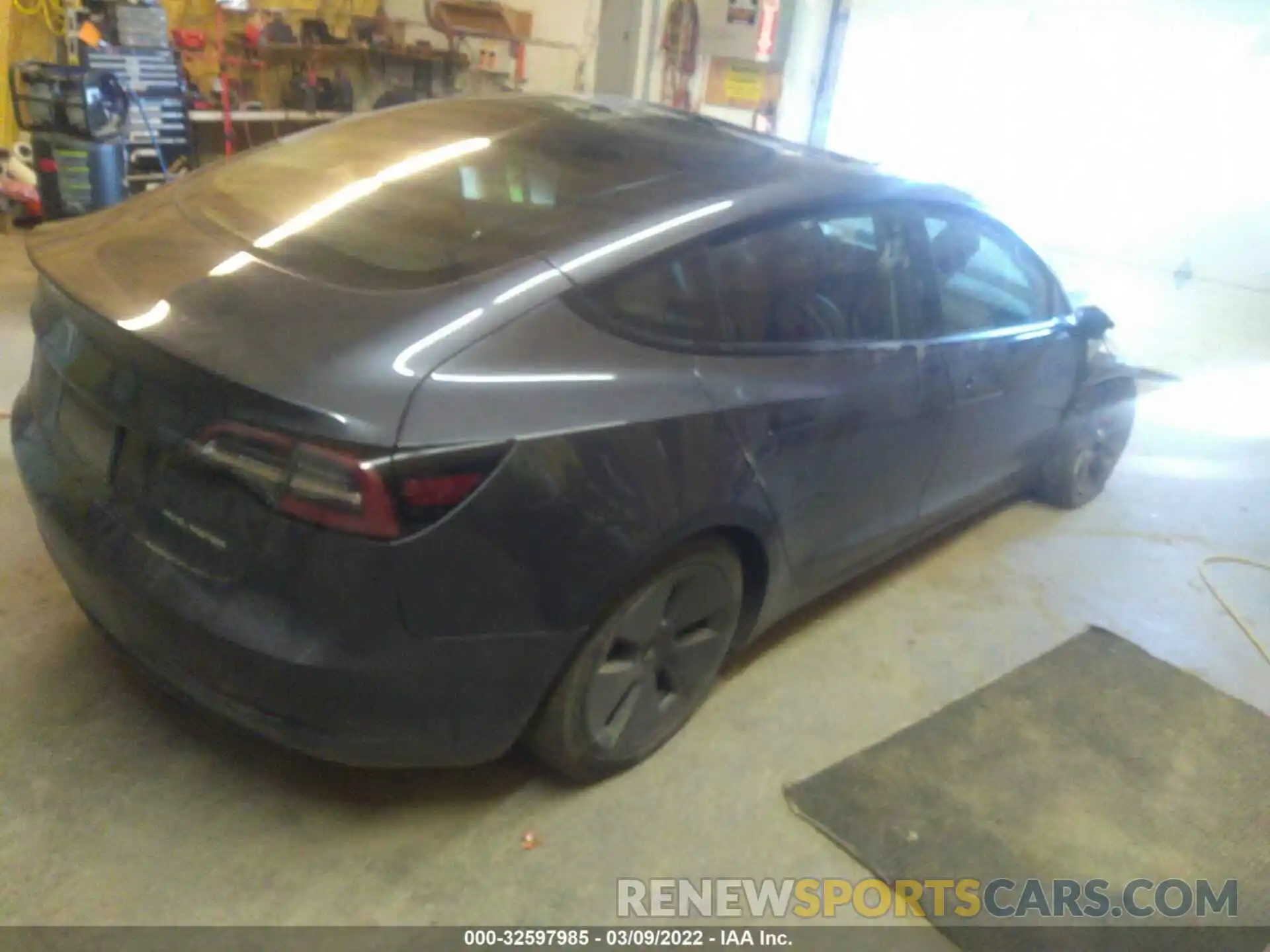 4 Photograph of a damaged car 5YJ3E1EBXNF135283 TESLA MODEL 3 2022