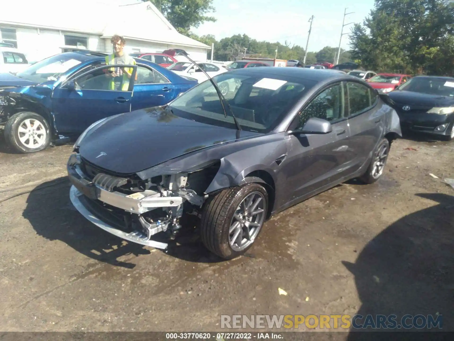 2 Photograph of a damaged car 5YJ3E1EBXNF170230 TESLA MODEL 3 2022