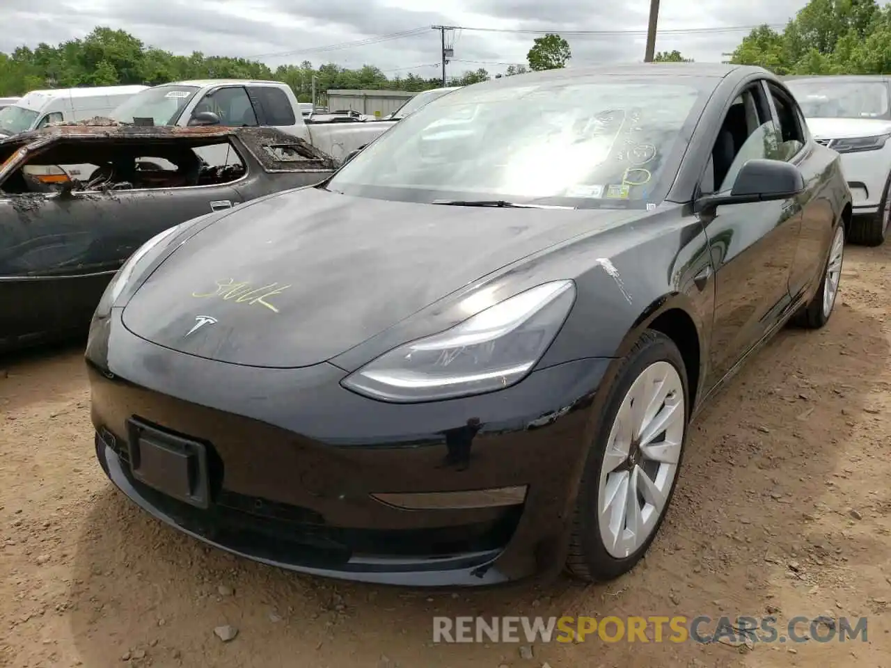 2 Photograph of a damaged car 5YJ3E1EBXNF187433 TESLA MODEL 3 2022