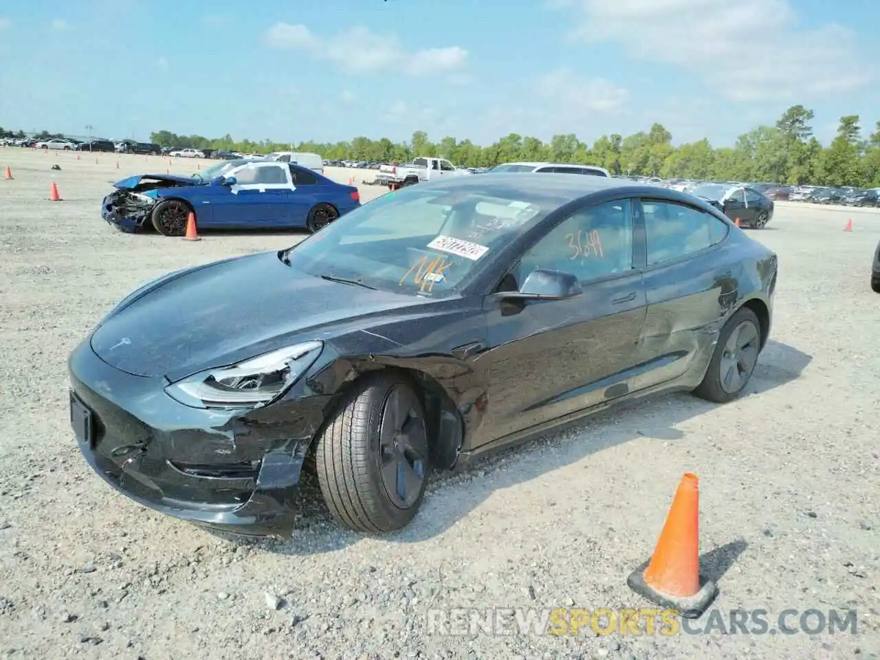 2 Photograph of a damaged car 5YJ3E1EBXNF190994 TESLA MODEL 3 2022