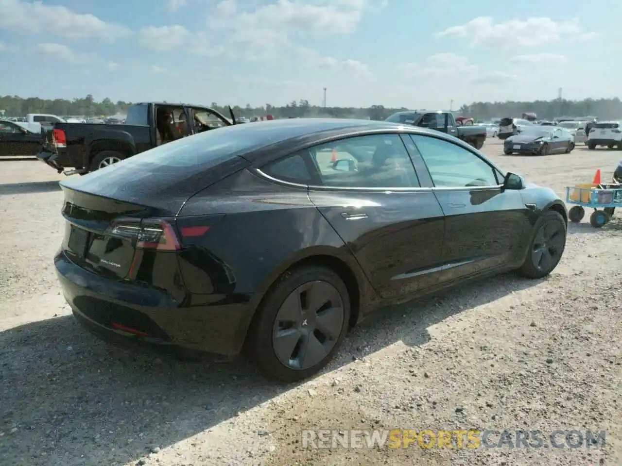 4 Photograph of a damaged car 5YJ3E1EBXNF190994 TESLA MODEL 3 2022