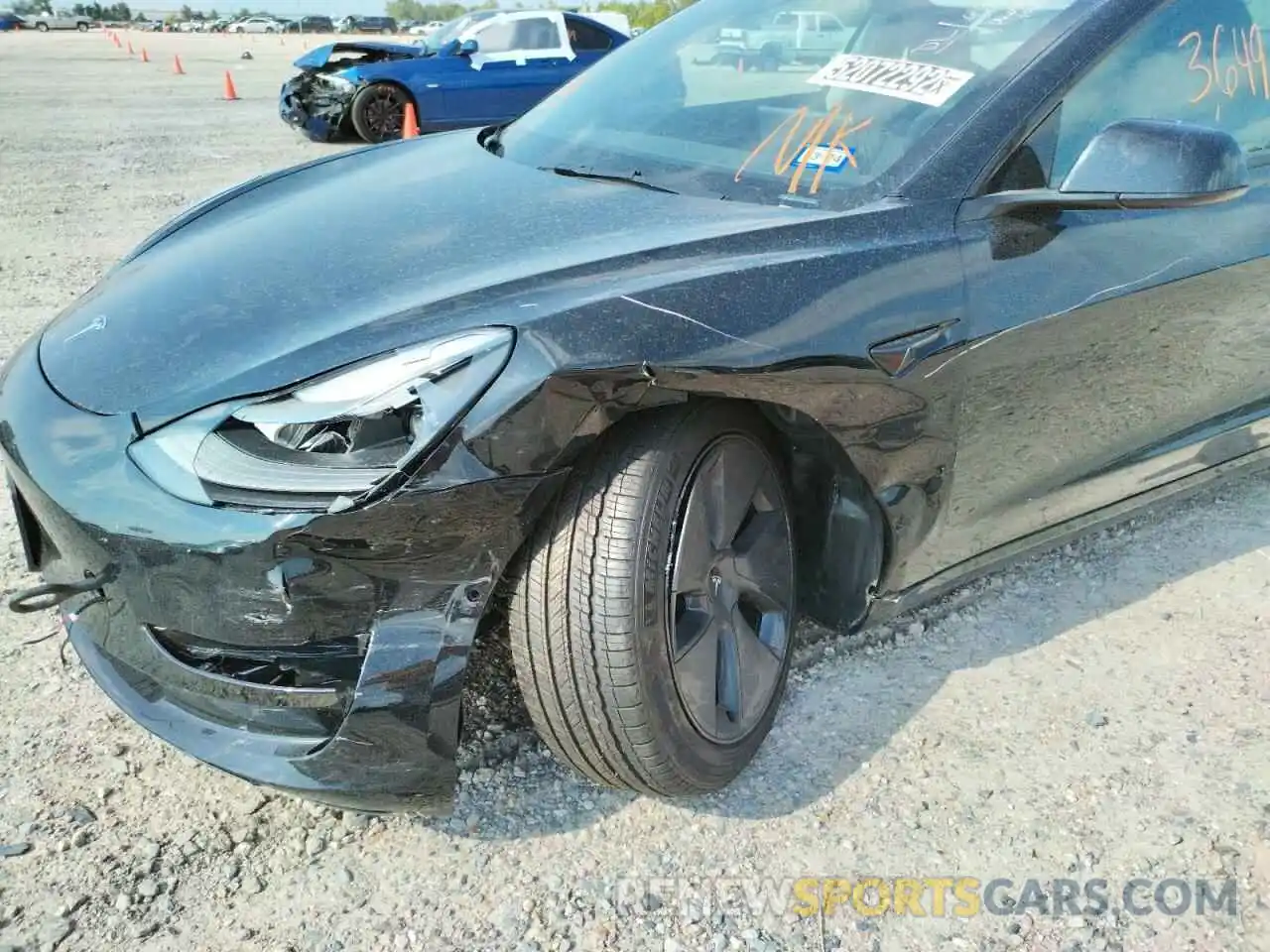 9 Photograph of a damaged car 5YJ3E1EBXNF190994 TESLA MODEL 3 2022