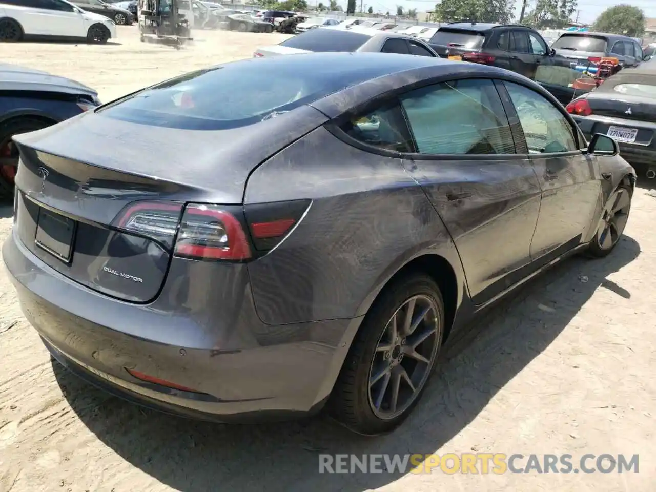 4 Photograph of a damaged car 5YJ3E1EBXNF192213 TESLA MODEL 3 2022