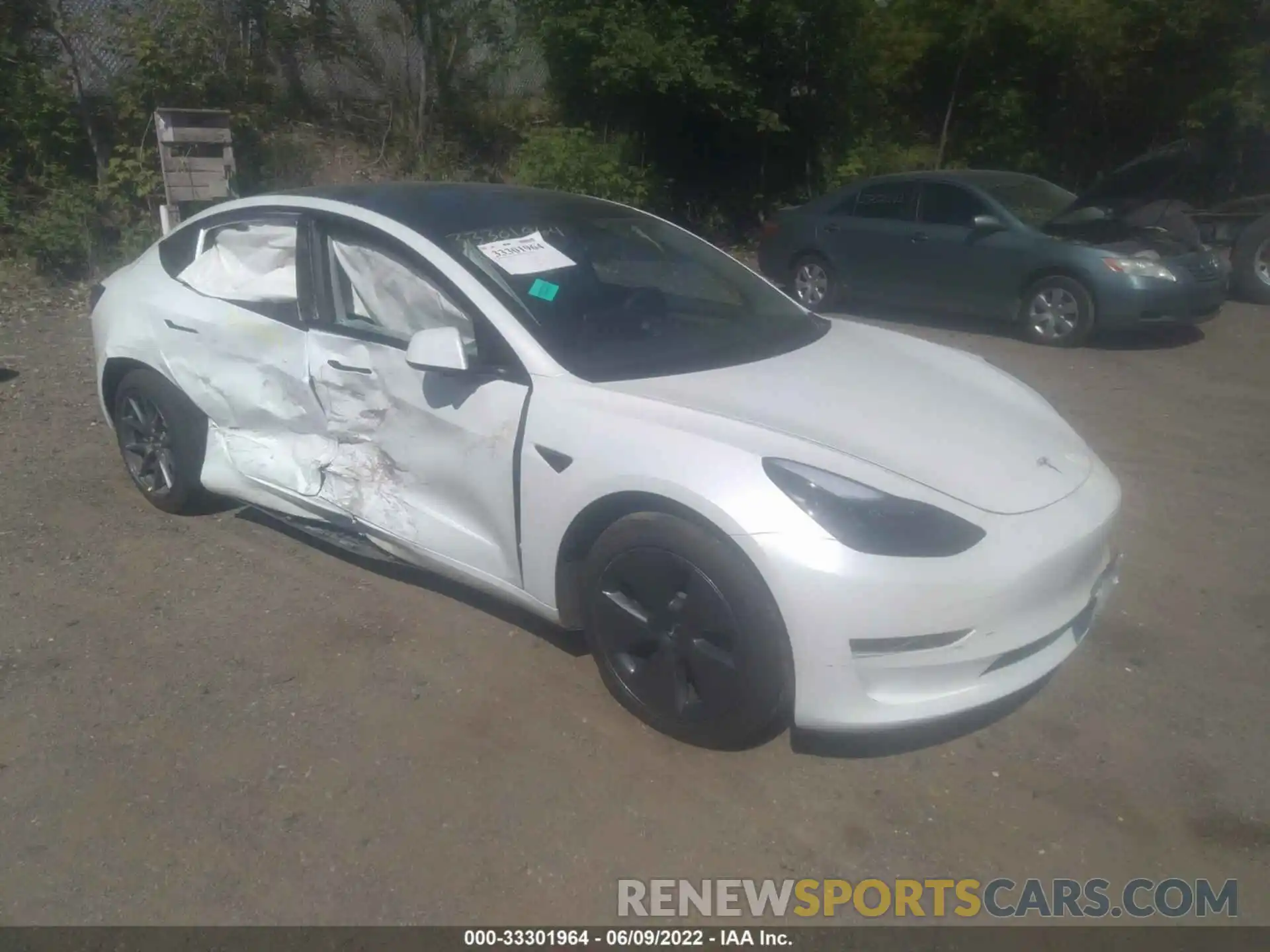 1 Photograph of a damaged car 5YJ3E1EBXNF199615 TESLA MODEL 3 2022