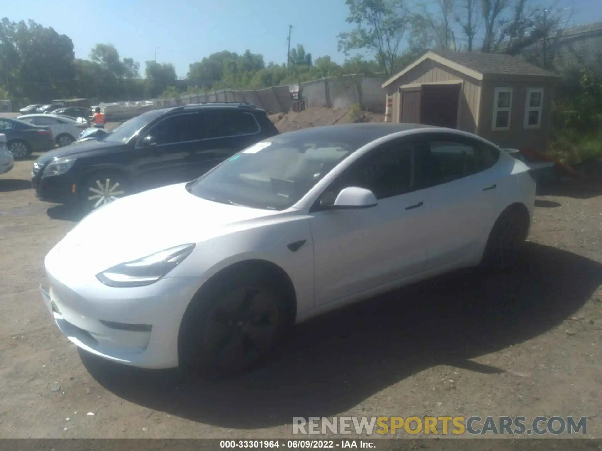 2 Photograph of a damaged car 5YJ3E1EBXNF199615 TESLA MODEL 3 2022