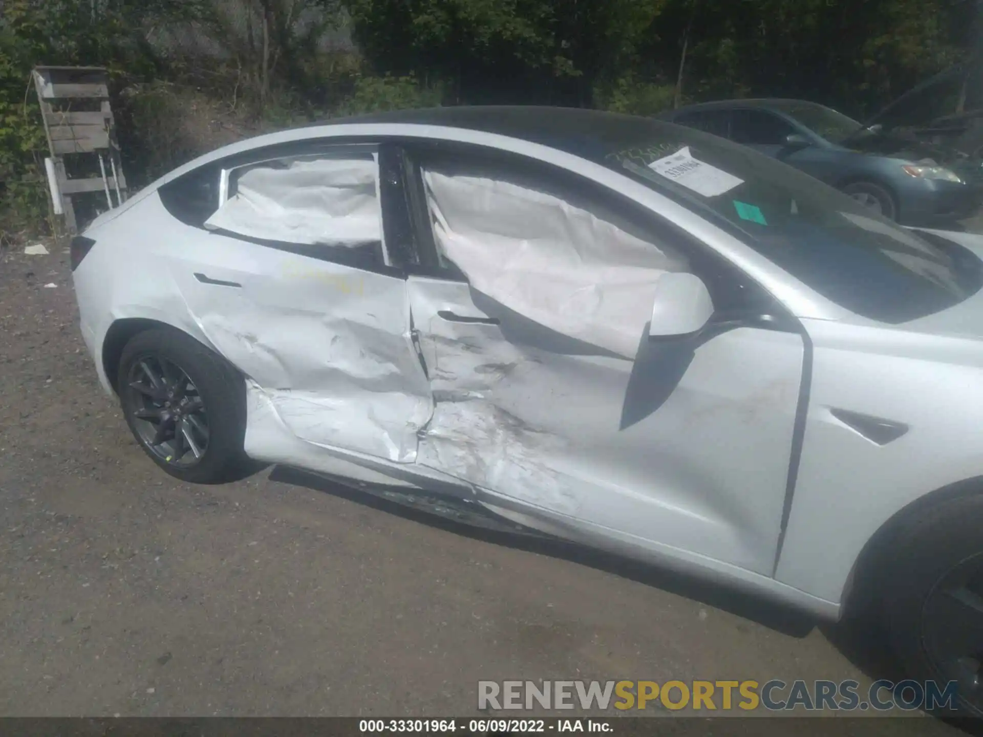 6 Photograph of a damaged car 5YJ3E1EBXNF199615 TESLA MODEL 3 2022