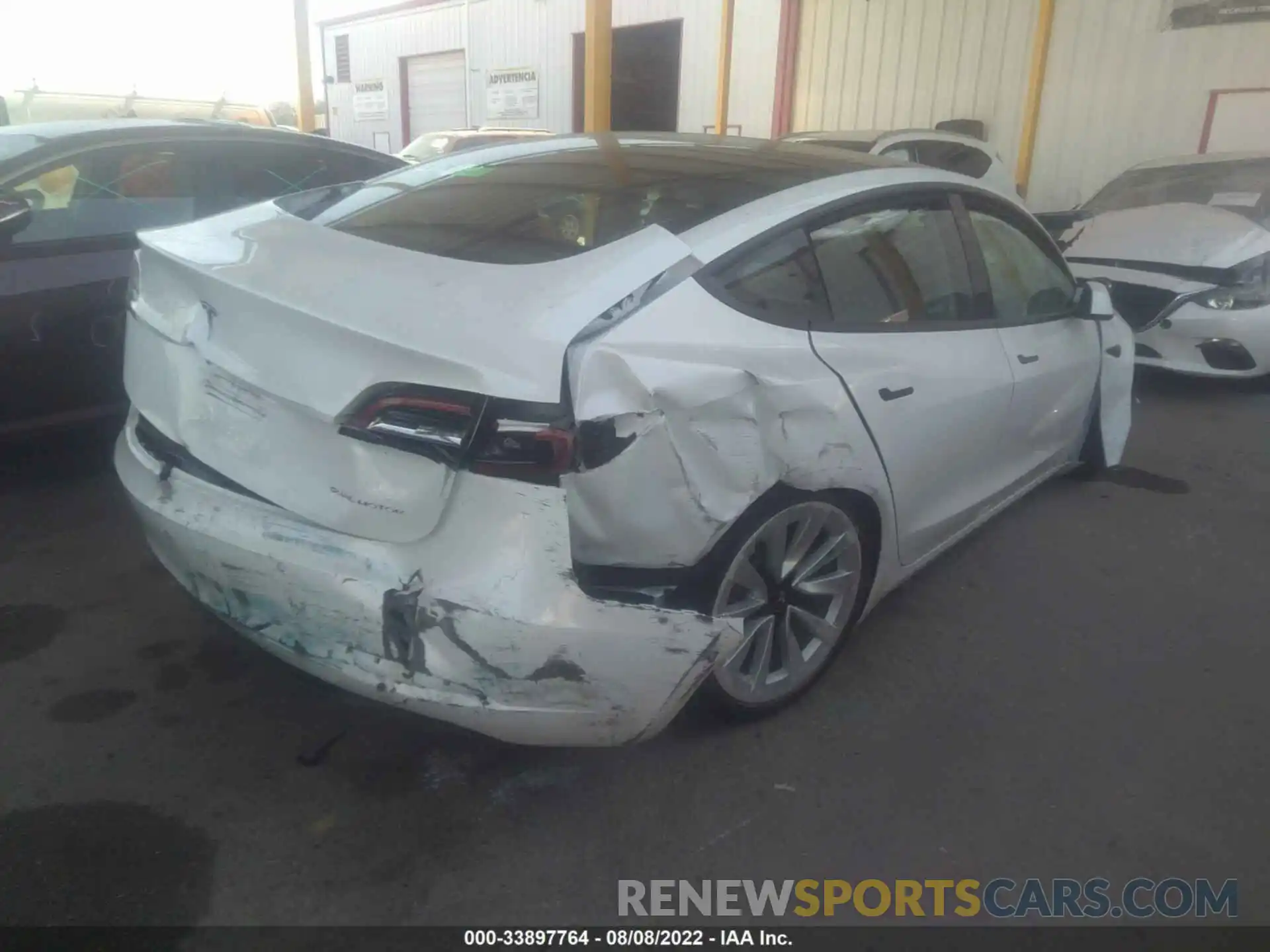 4 Photograph of a damaged car 5YJ3E1EBXNF211309 TESLA MODEL 3 2022