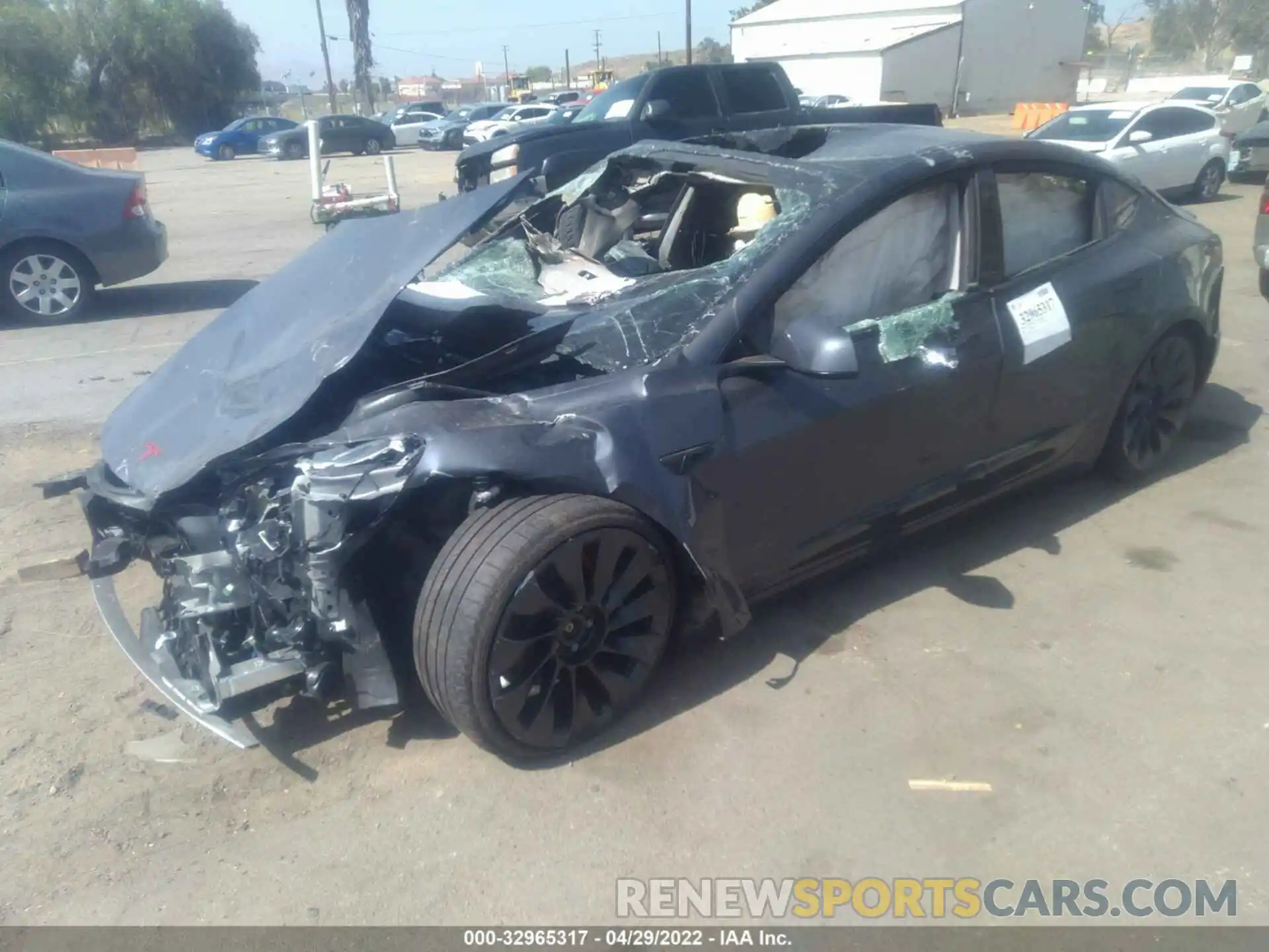 2 Photograph of a damaged car 5YJ3E1EC0NF183061 TESLA MODEL 3 2022