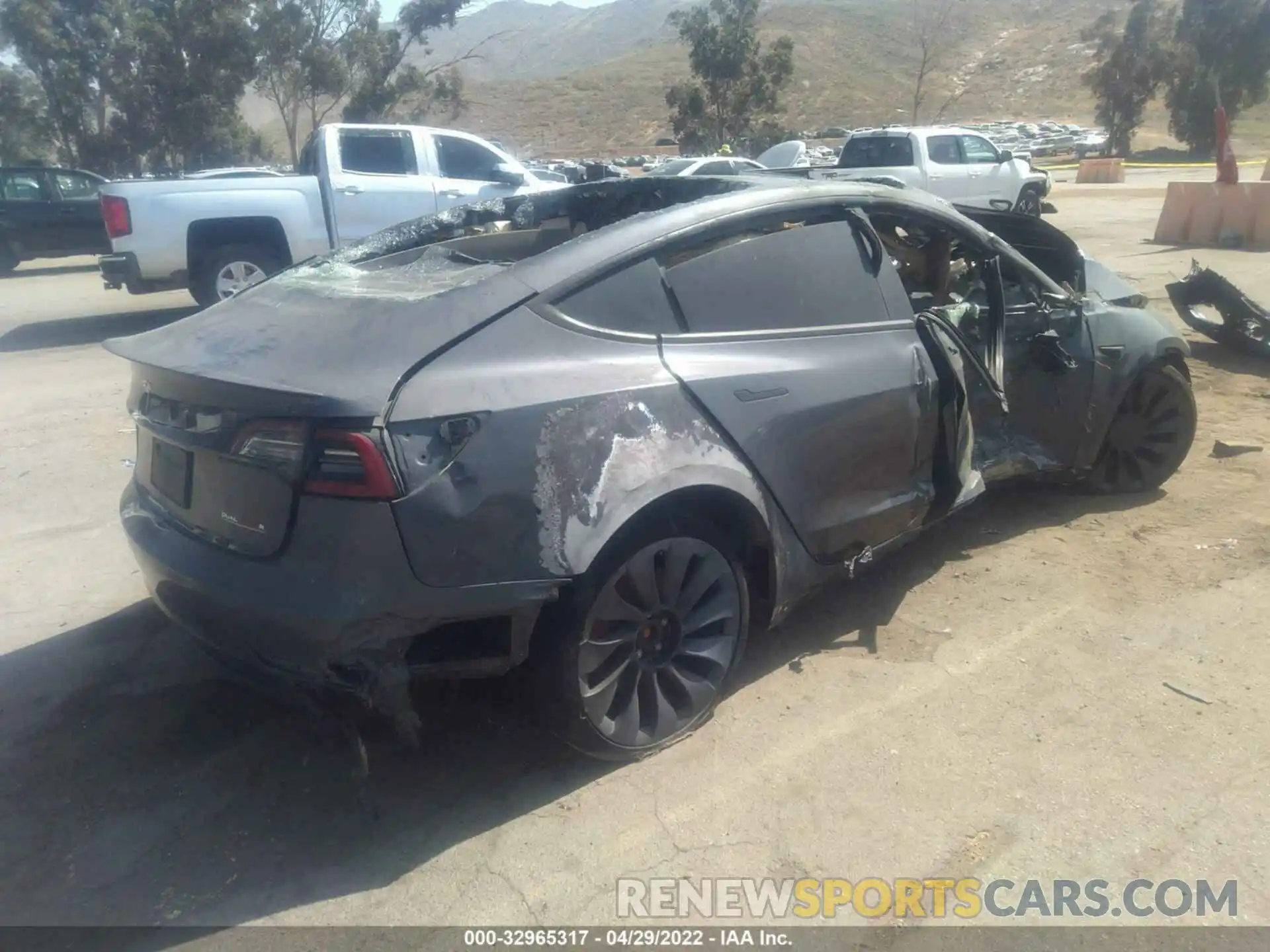 4 Photograph of a damaged car 5YJ3E1EC0NF183061 TESLA MODEL 3 2022