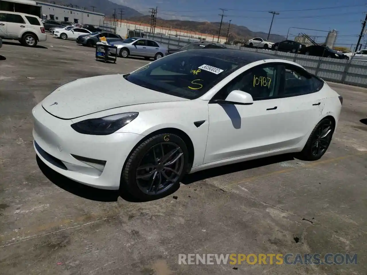 2 Photograph of a damaged car 5YJ3E1EC1NF103864 TESLA MODEL 3 2022