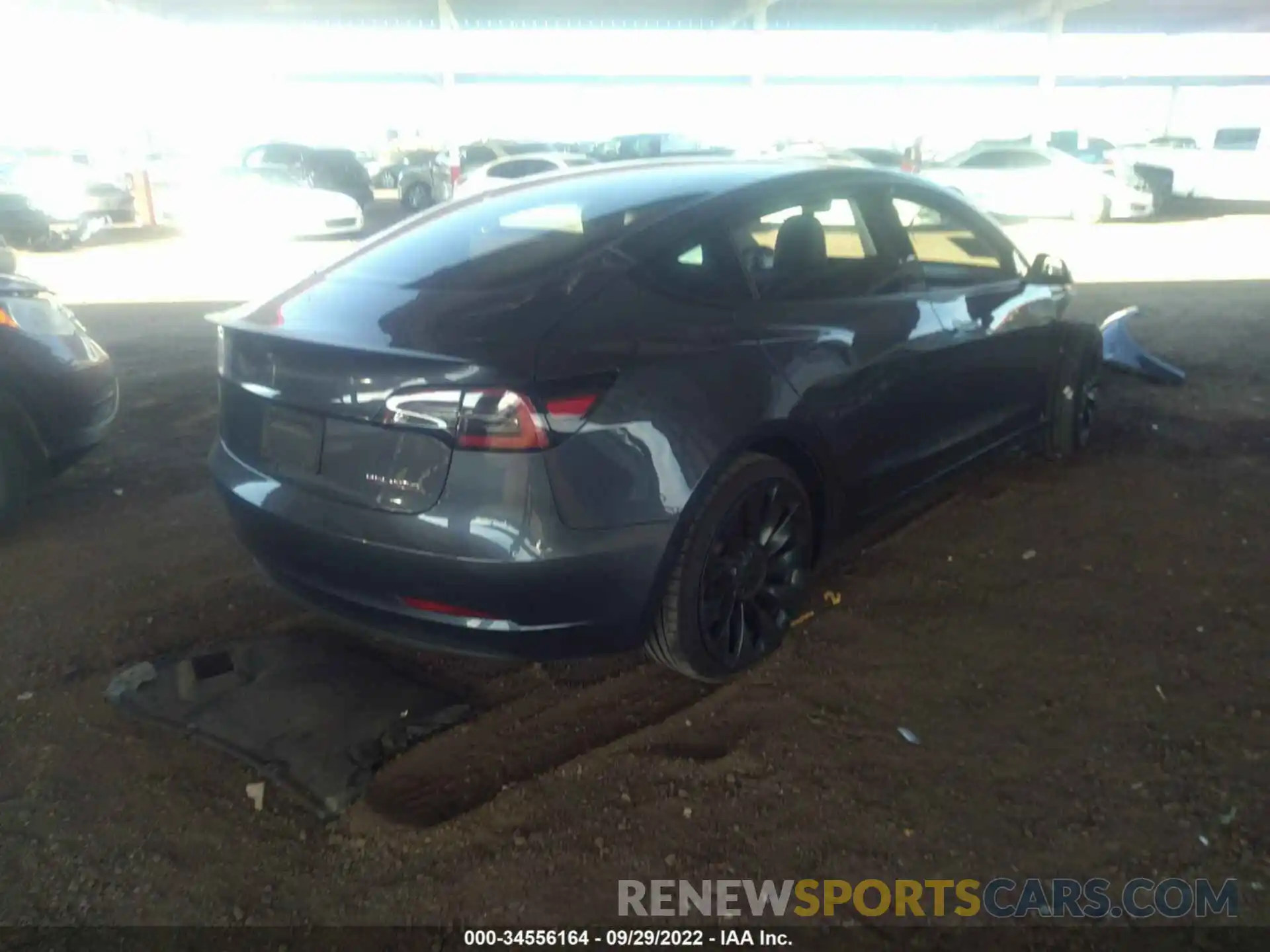 4 Photograph of a damaged car 5YJ3E1EC1NF173641 TESLA MODEL 3 2022