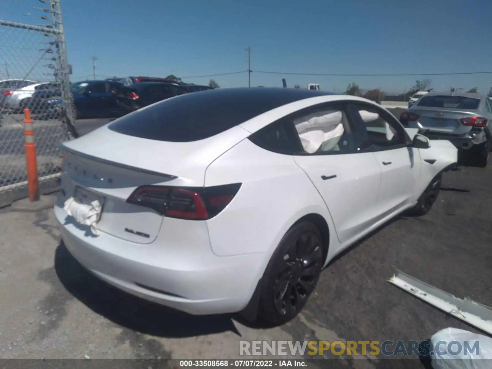 4 Photograph of a damaged car 5YJ3E1EC1NF242036 TESLA MODEL 3 2022