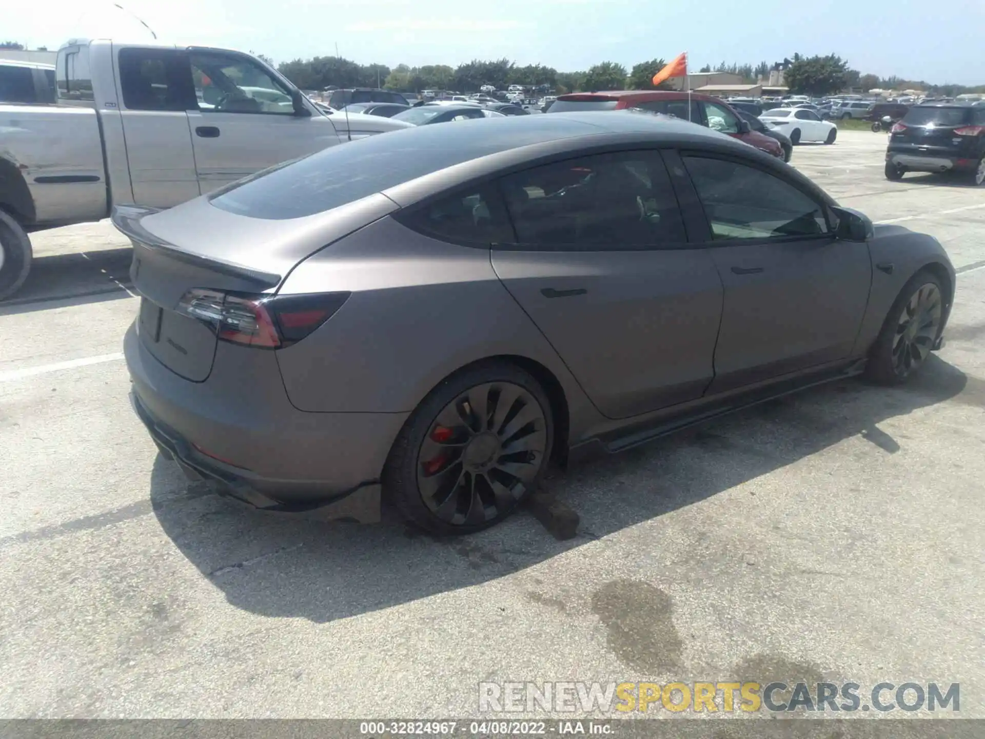 4 Photograph of a damaged car 5YJ3E1EC3NF111609 TESLA MODEL 3 2022