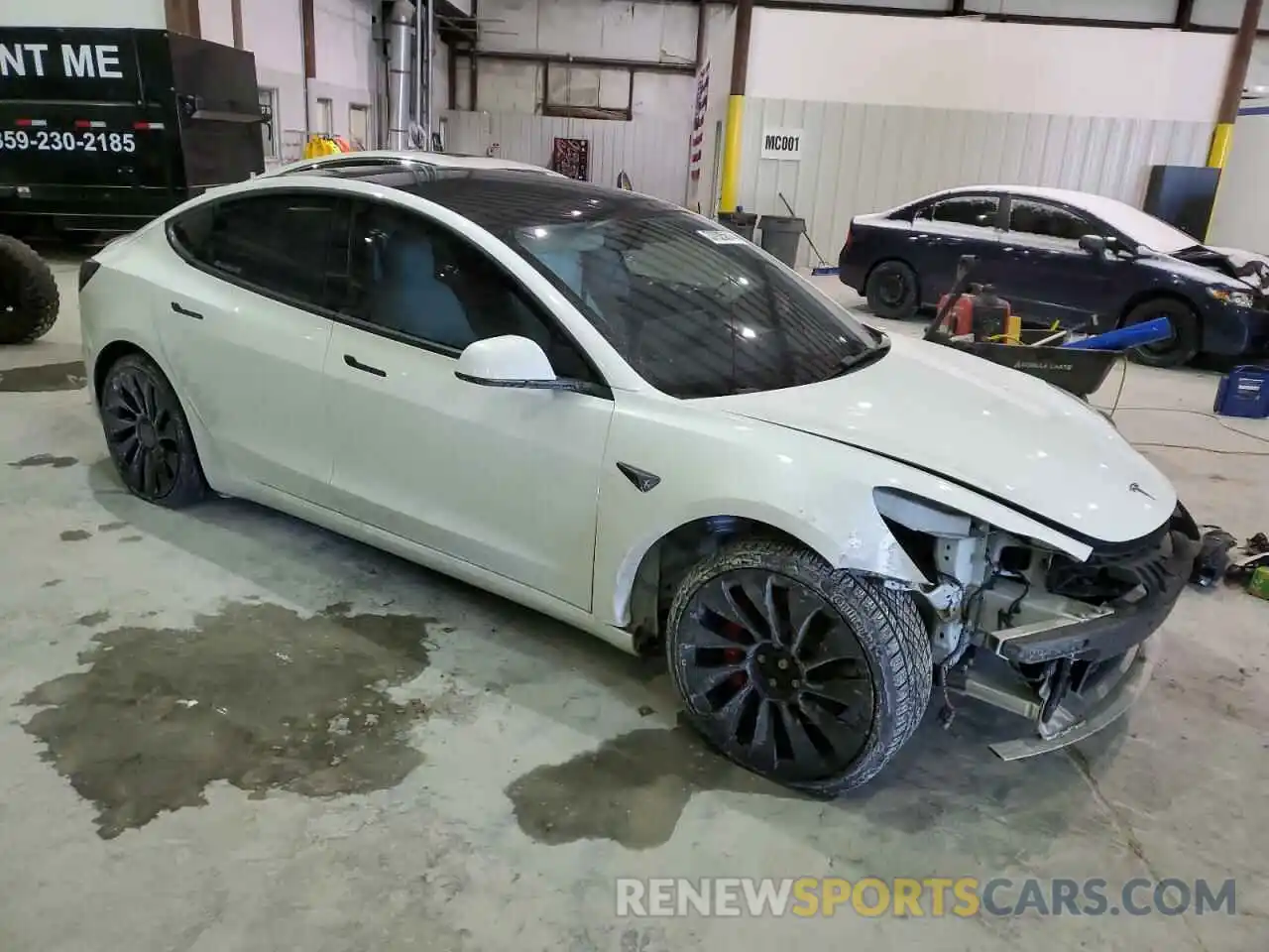 4 Photograph of a damaged car 5YJ3E1EC3NF235234 TESLA MODEL 3 2022