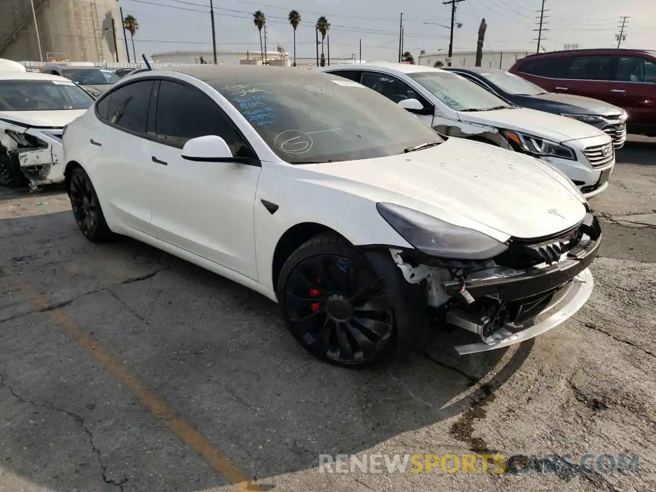 1 Photograph of a damaged car 5YJ3E1EC4NF298682 TESLA MODEL 3 2022