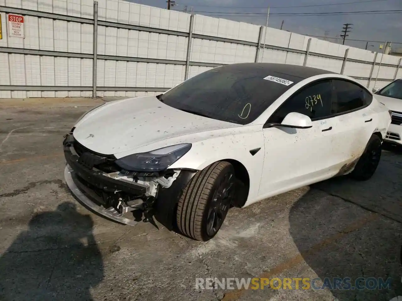 2 Photograph of a damaged car 5YJ3E1EC4NF298682 TESLA MODEL 3 2022