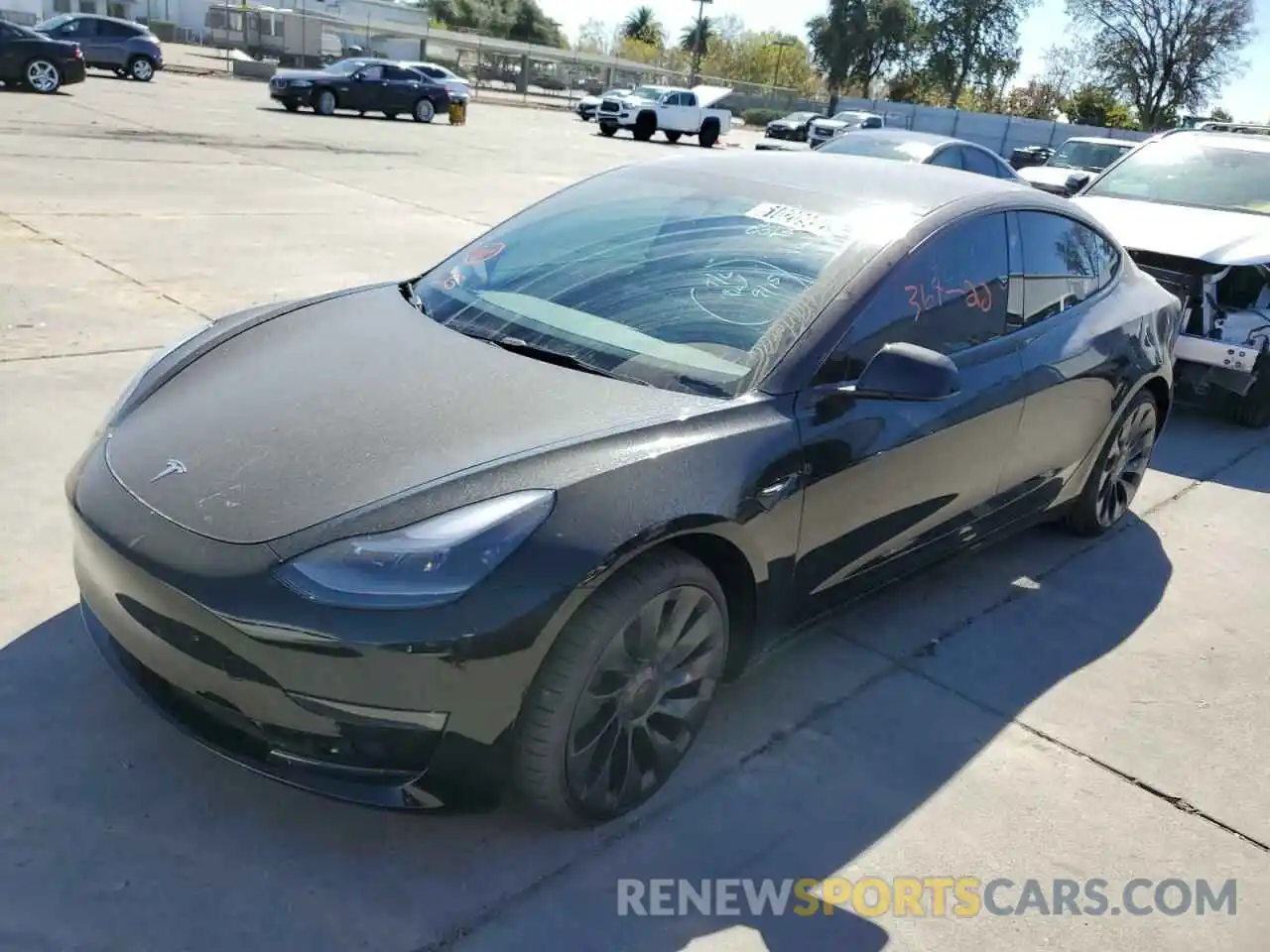 2 Photograph of a damaged car 5YJ3E1EC4NF317330 TESLA MODEL 3 2022