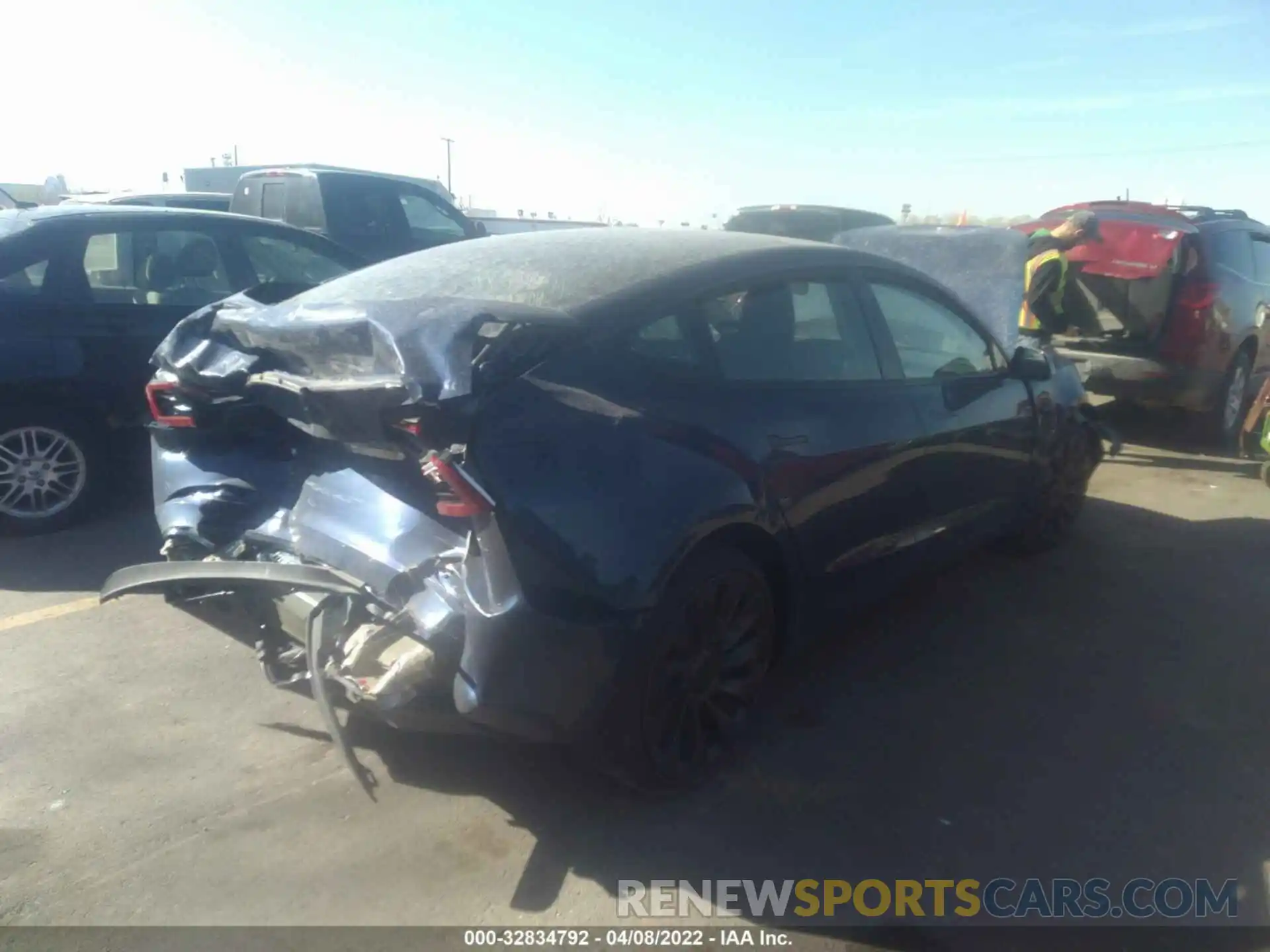 4 Photograph of a damaged car 5YJ3E1EC5NF164196 TESLA MODEL 3 2022