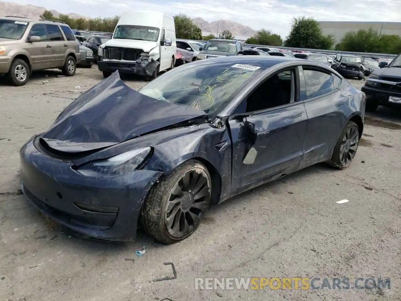 2 Photograph of a damaged car 5YJ3E1EC5NF179765 TESLA MODEL 3 2022