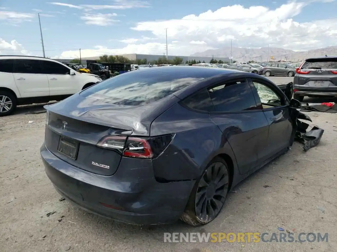 4 Photograph of a damaged car 5YJ3E1EC5NF179765 TESLA MODEL 3 2022