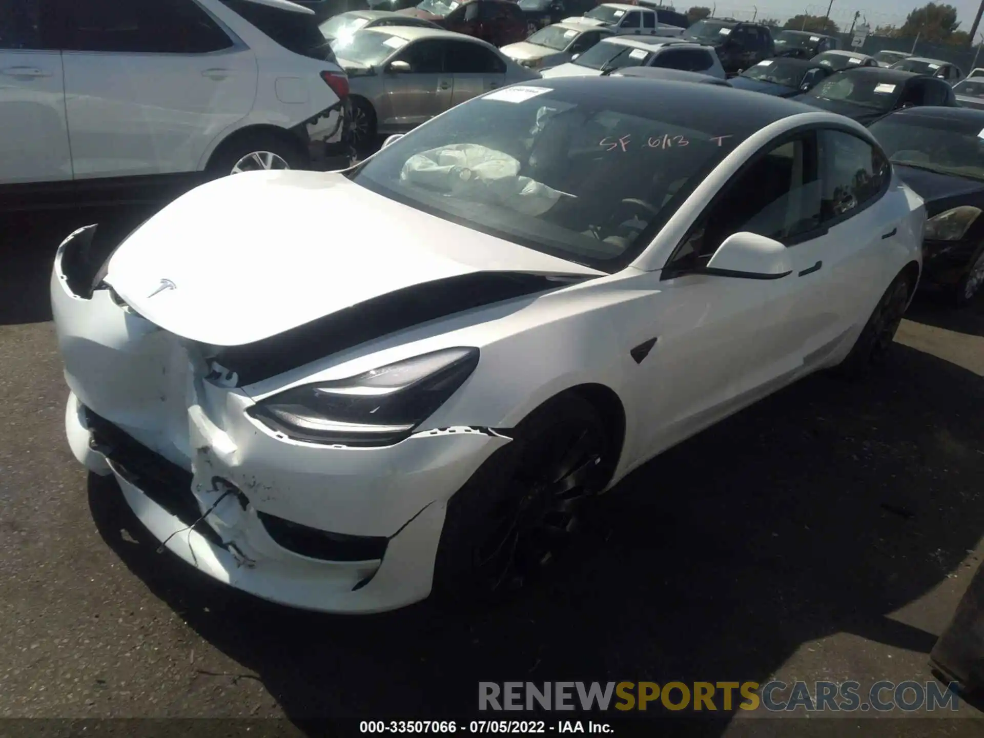 2 Photograph of a damaged car 5YJ3E1EC5NF182536 TESLA MODEL 3 2022