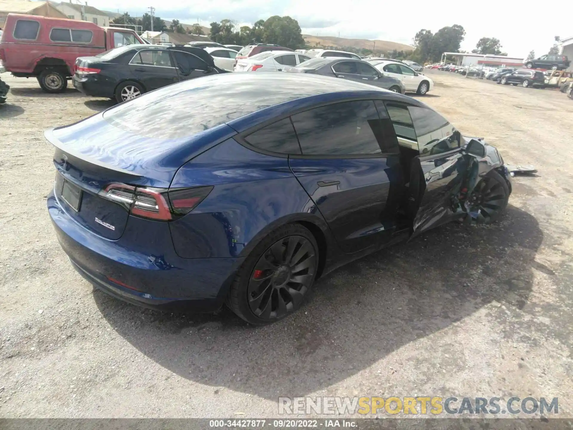 4 Photograph of a damaged car 5YJ3E1EC5NF267294 TESLA MODEL 3 2022