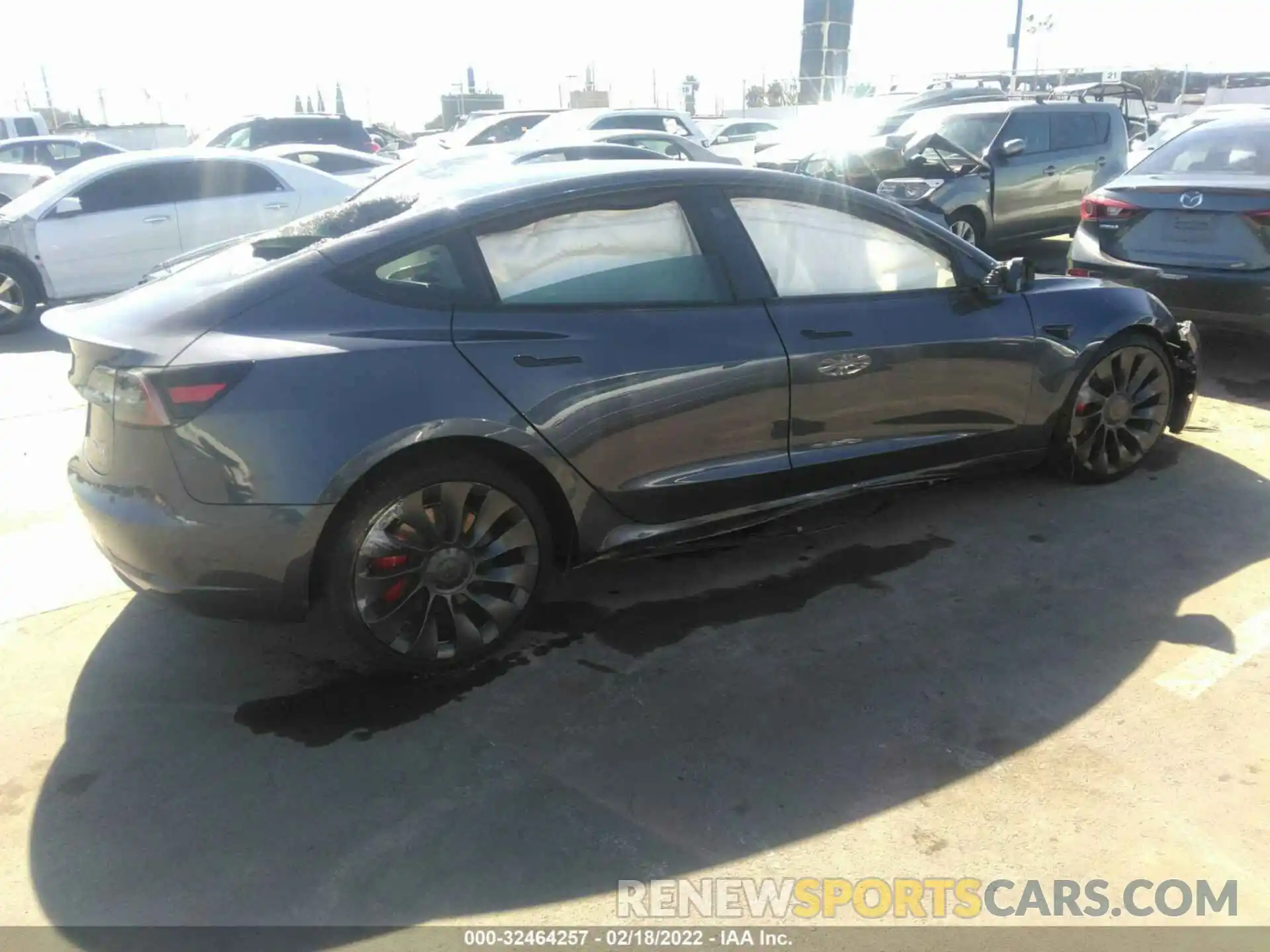 4 Photograph of a damaged car 5YJ3E1EC6NF131398 TESLA MODEL 3 2022