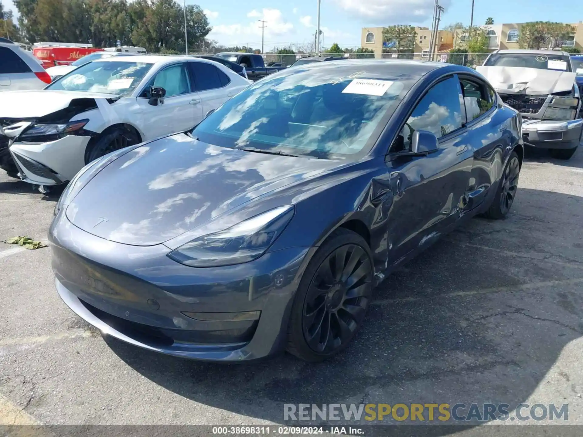 2 Photograph of a damaged car 5YJ3E1EC6NF293581 TESLA MODEL 3 2022