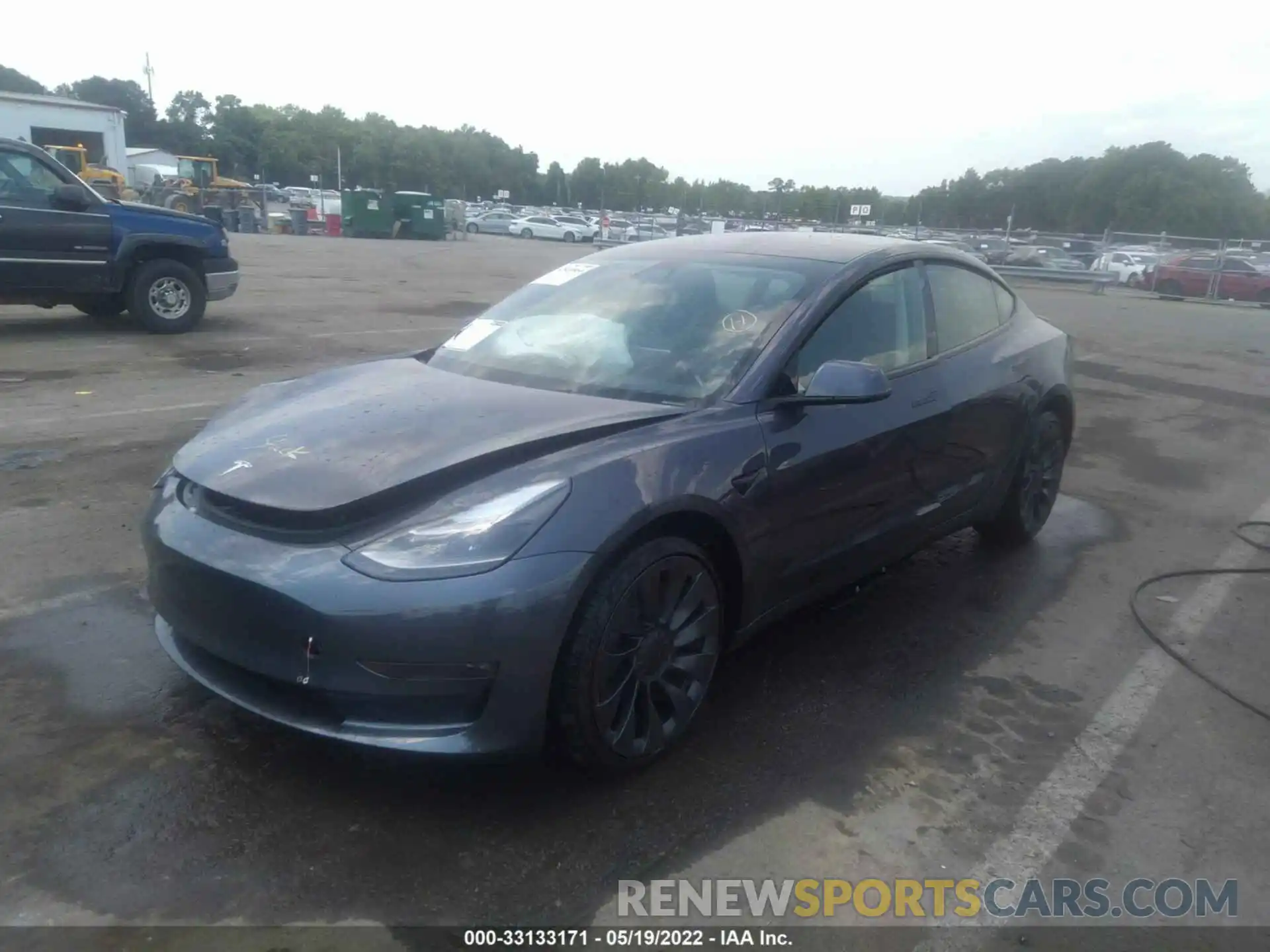 2 Photograph of a damaged car 5YJ3E1EC7NF103271 TESLA MODEL 3 2022