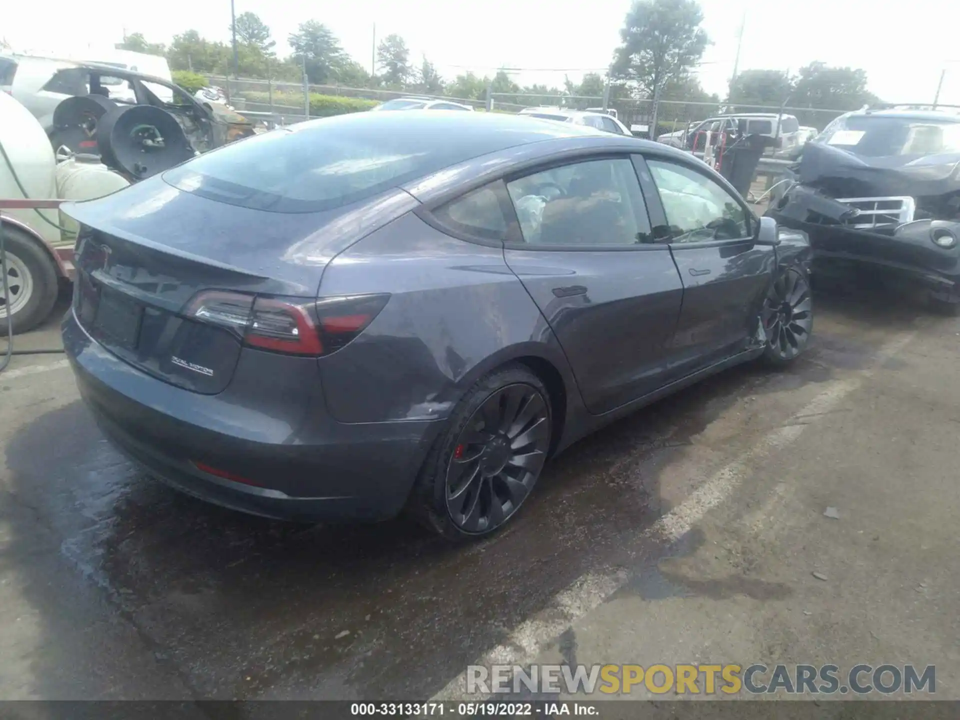 4 Photograph of a damaged car 5YJ3E1EC7NF103271 TESLA MODEL 3 2022