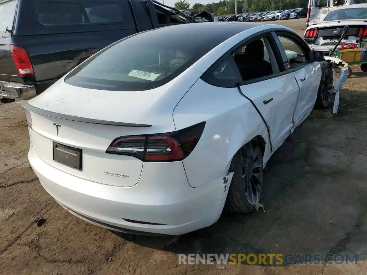 4 Photograph of a damaged car 5YJ3E1EC7NF154947 TESLA MODEL 3 2022