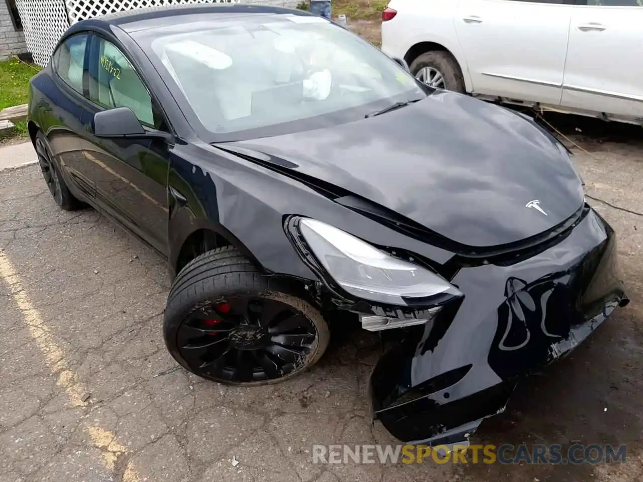 1 Photograph of a damaged car 5YJ3E1EC7NF203323 TESLA MODEL 3 2022