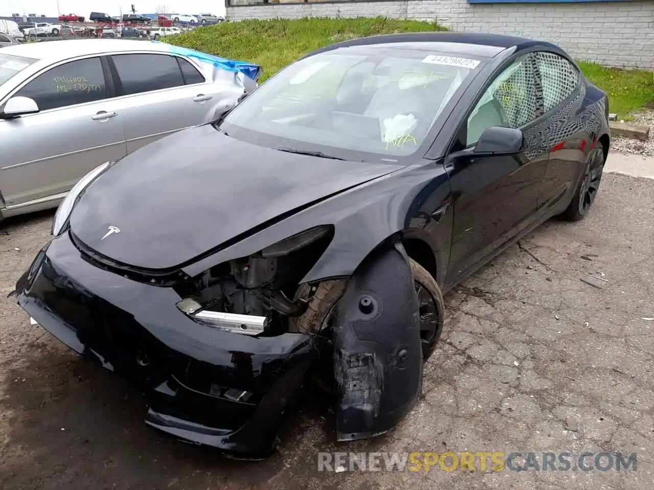 2 Photograph of a damaged car 5YJ3E1EC7NF203323 TESLA MODEL 3 2022