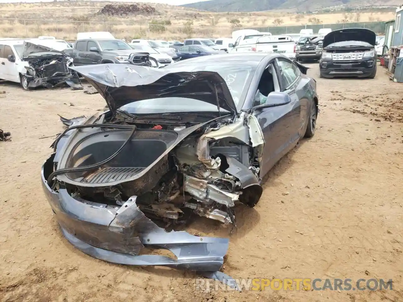 2 Photograph of a damaged car 5YJ3E1EC8NF154097 TESLA MODEL 3 2022