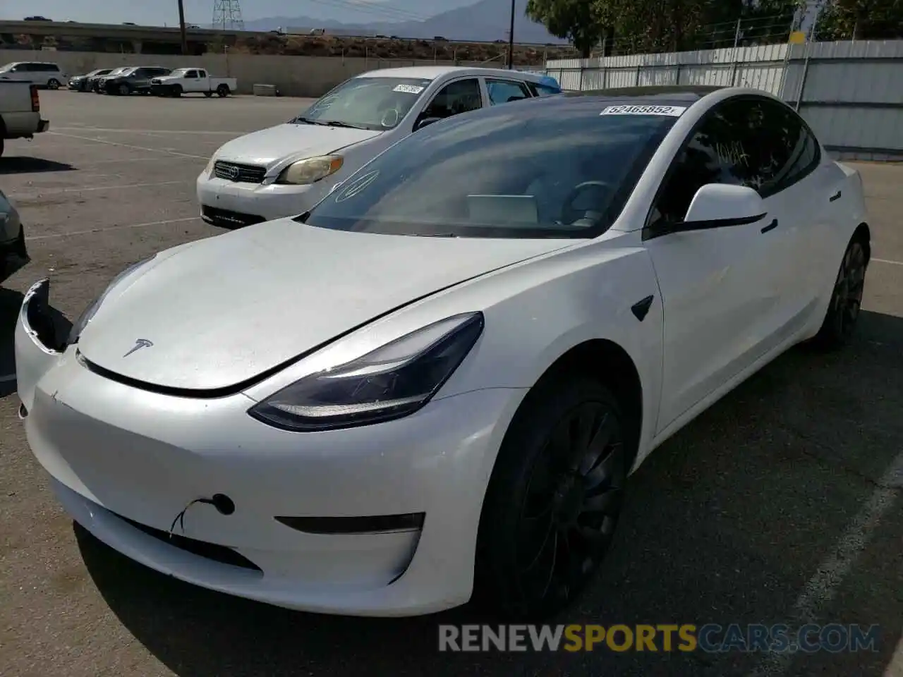 2 Photograph of a damaged car 5YJ3E1EC8NF209079 TESLA MODEL 3 2022