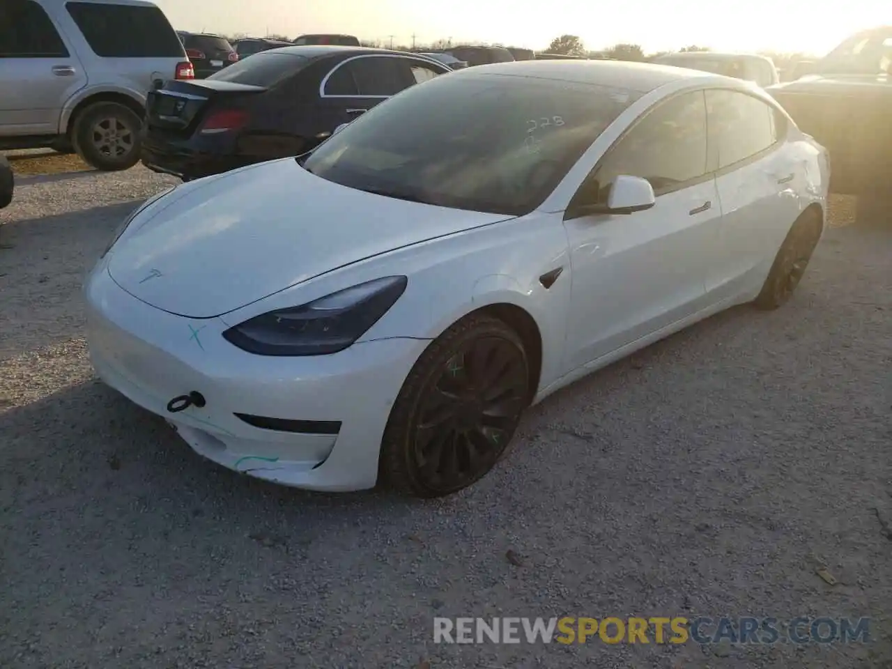 2 Photograph of a damaged car 5YJ3E1EC9NF134621 TESLA MODEL 3 2022