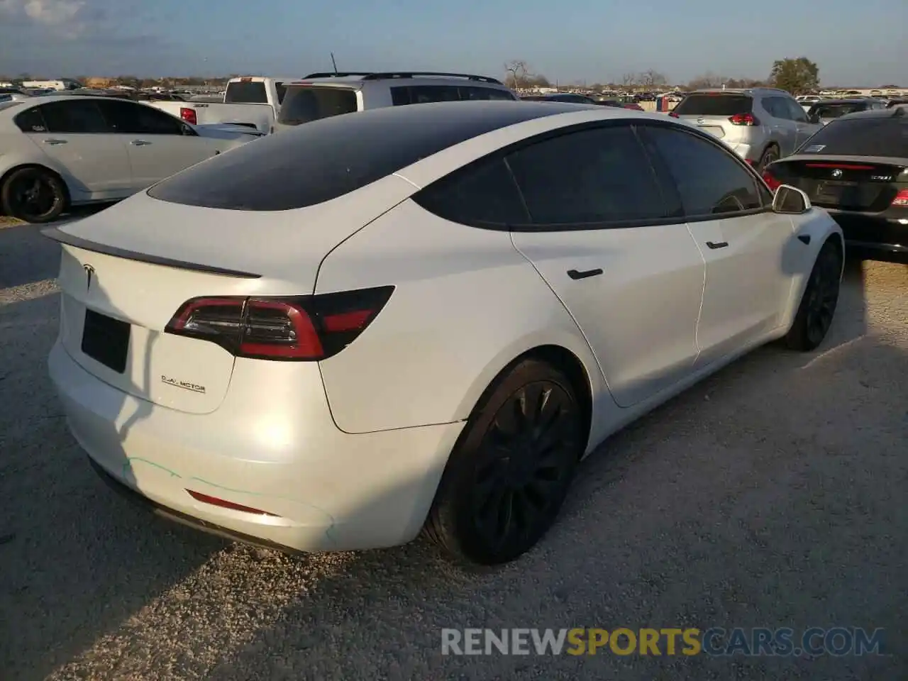 4 Фотография поврежденного автомобиля 5YJ3E1EC9NF134621 TESLA MODEL 3 2022