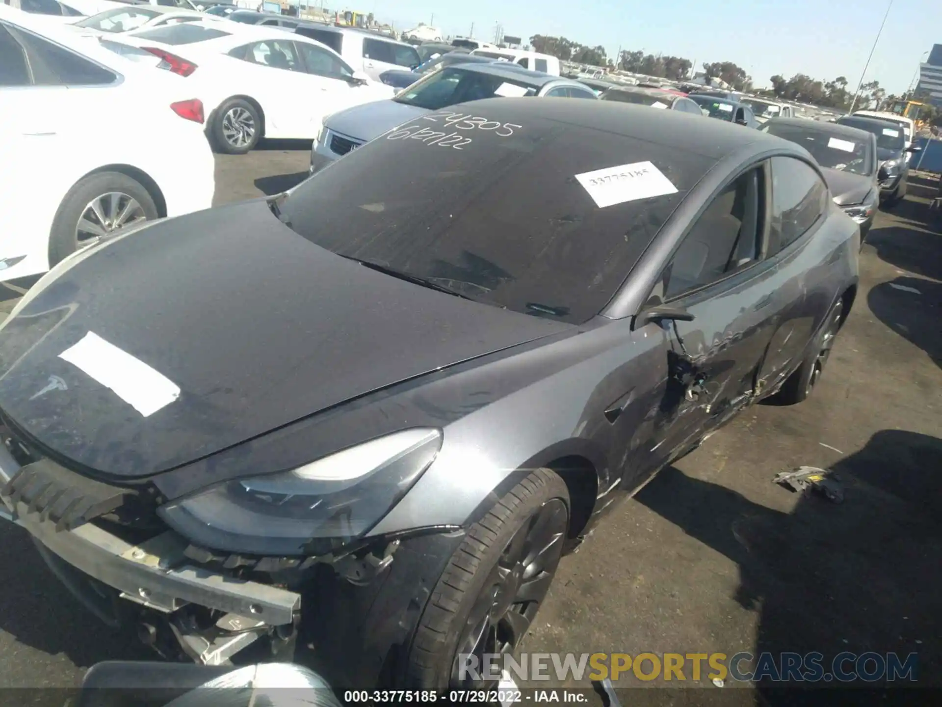 2 Photograph of a damaged car 5YJ3E1EC9NF228854 TESLA MODEL 3 2022