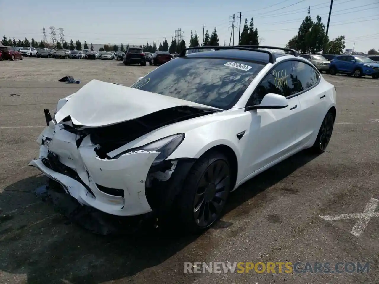 2 Photograph of a damaged car 5YJ3E1ECXNF133283 TESLA MODEL 3 2022