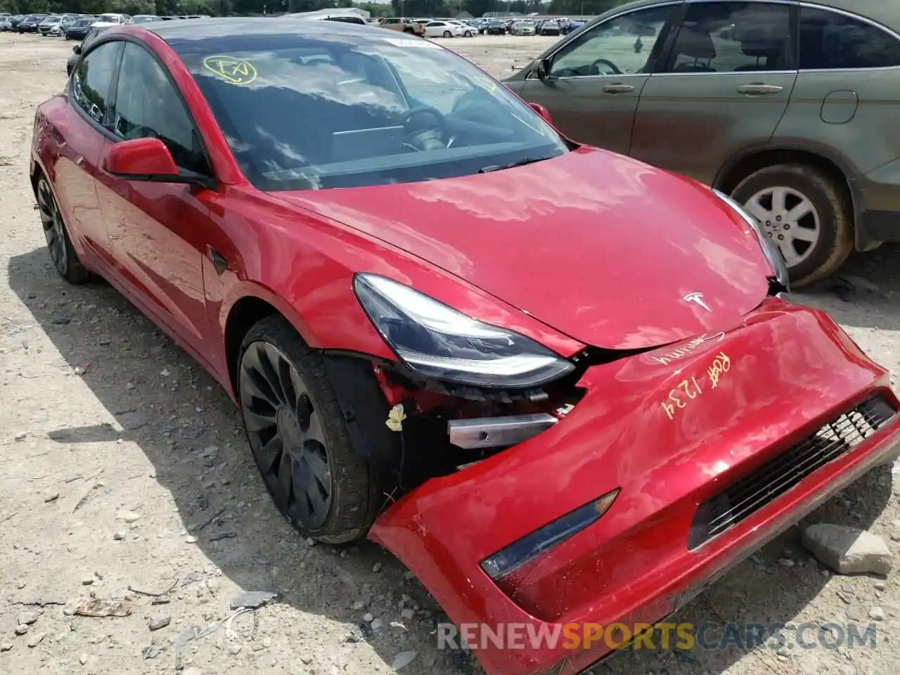 1 Photograph of a damaged car 5YJ3E1ECXNF263323 TESLA MODEL 3 2022