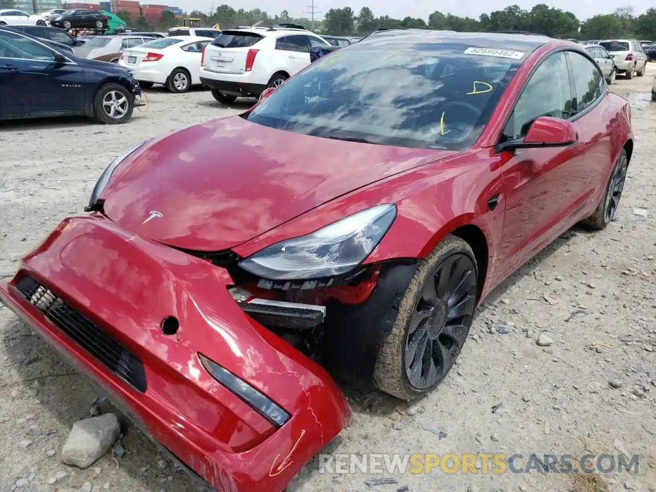 2 Photograph of a damaged car 5YJ3E1ECXNF263323 TESLA MODEL 3 2022