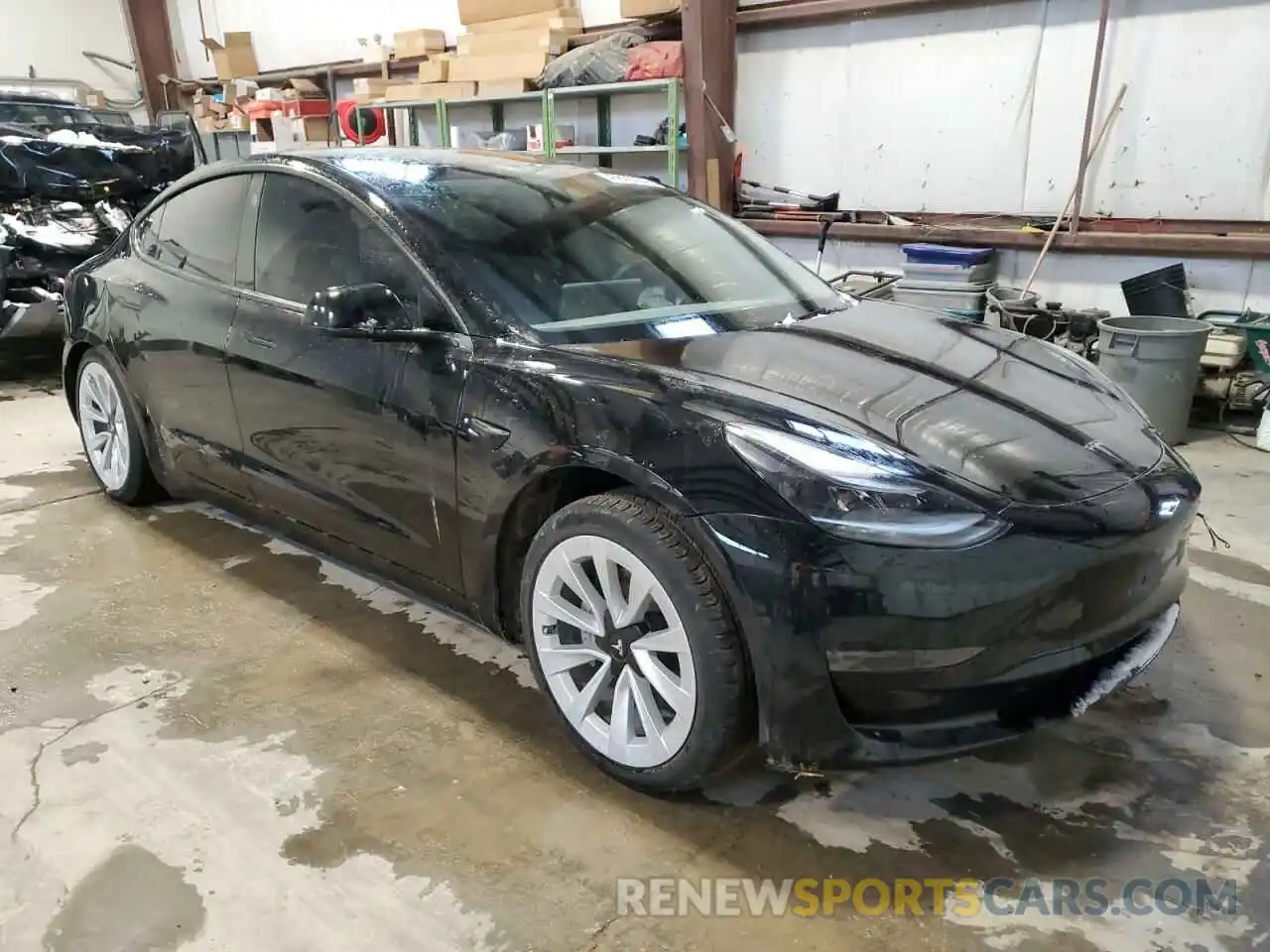 4 Photograph of a damaged car 5YJ3E1EA0PF428748 TESLA MODEL 3 2023