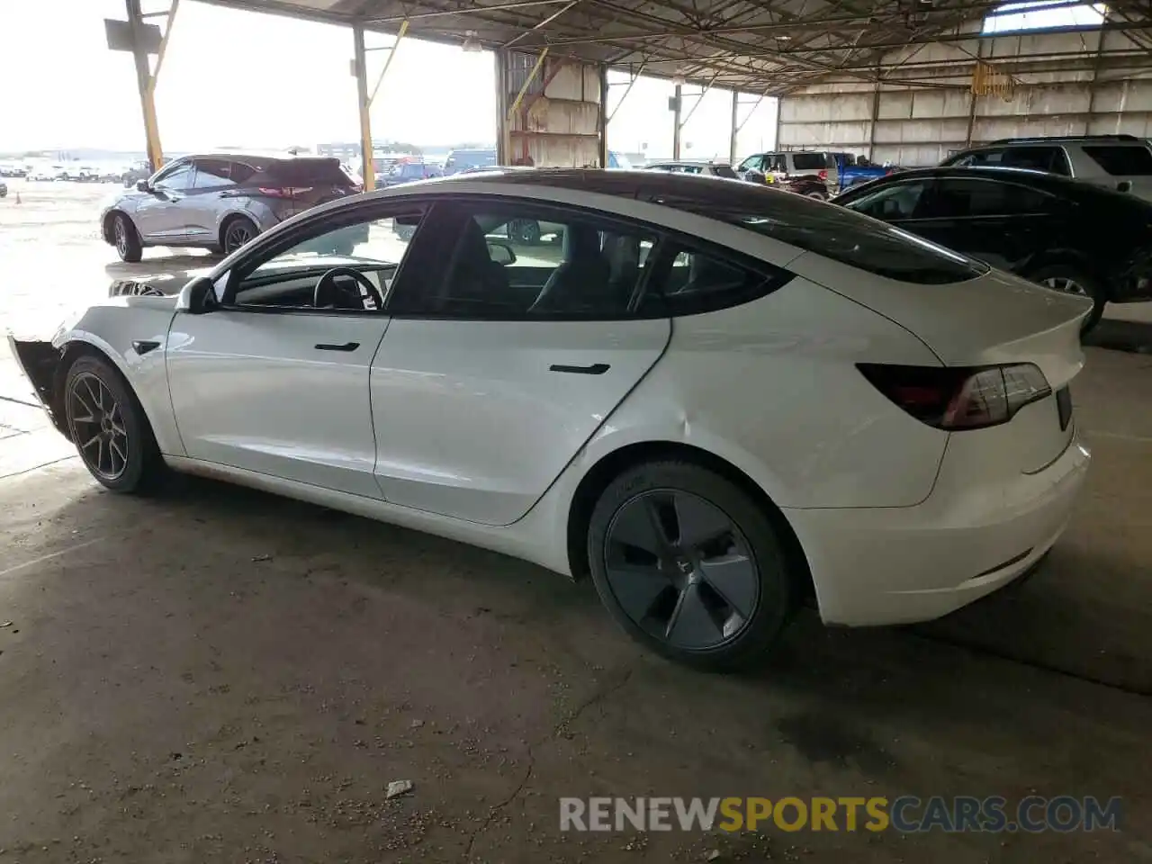 2 Photograph of a damaged car 5YJ3E1EA0PF493597 TESLA MODEL 3 2023