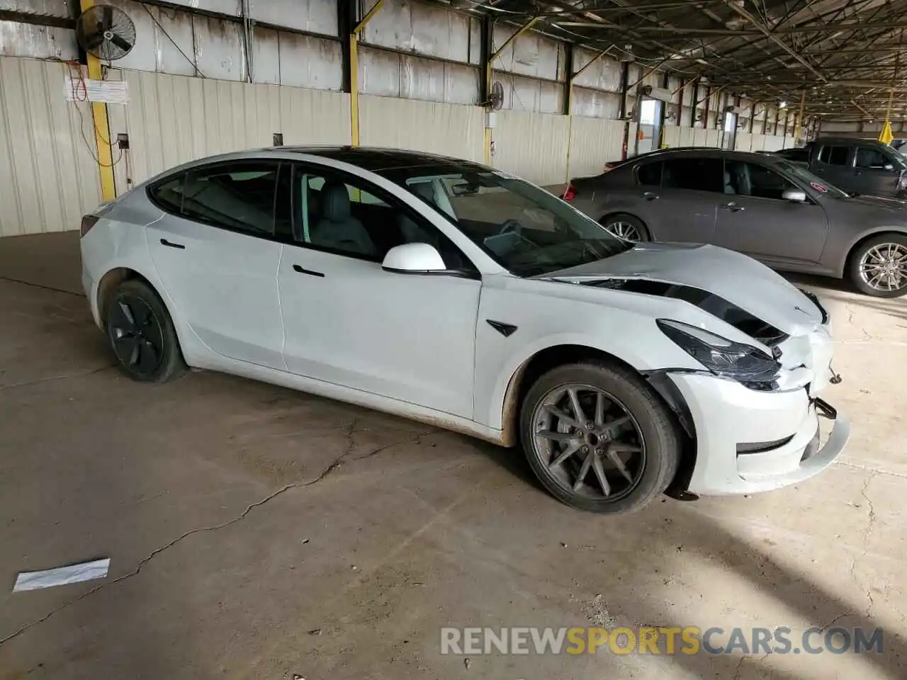 4 Фотография поврежденного автомобиля 5YJ3E1EA0PF493597 TESLA MODEL 3 2023