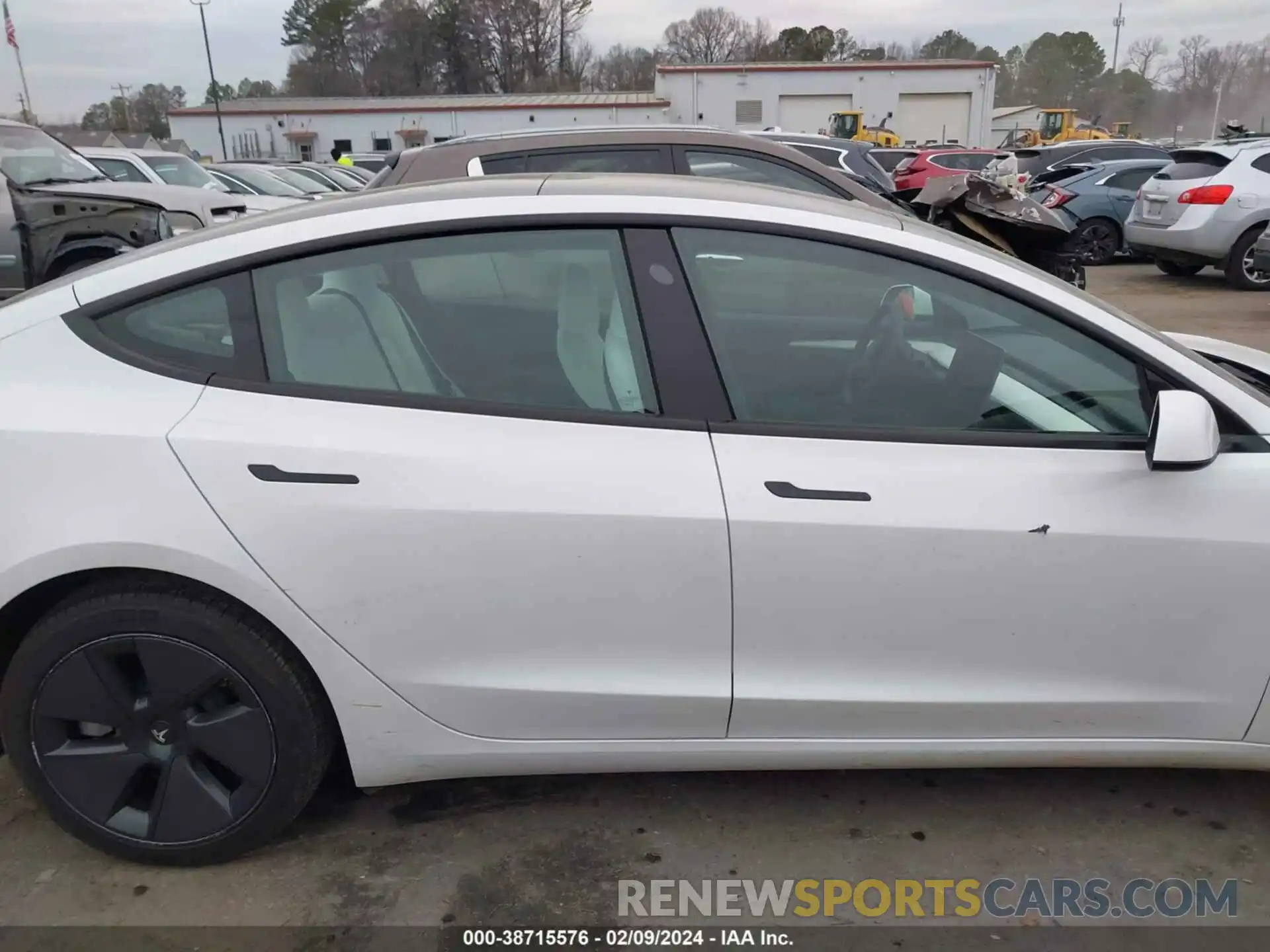 13 Photograph of a damaged car 5YJ3E1EA0PF603127 TESLA MODEL 3 2023