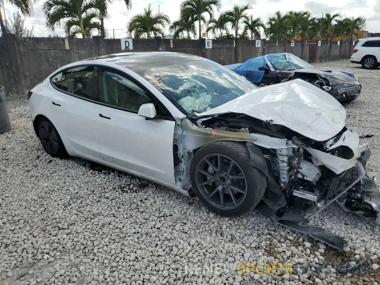 4 Photograph of a damaged car 5YJ3E1EA1PF558778 TESLA MODEL 3 2023