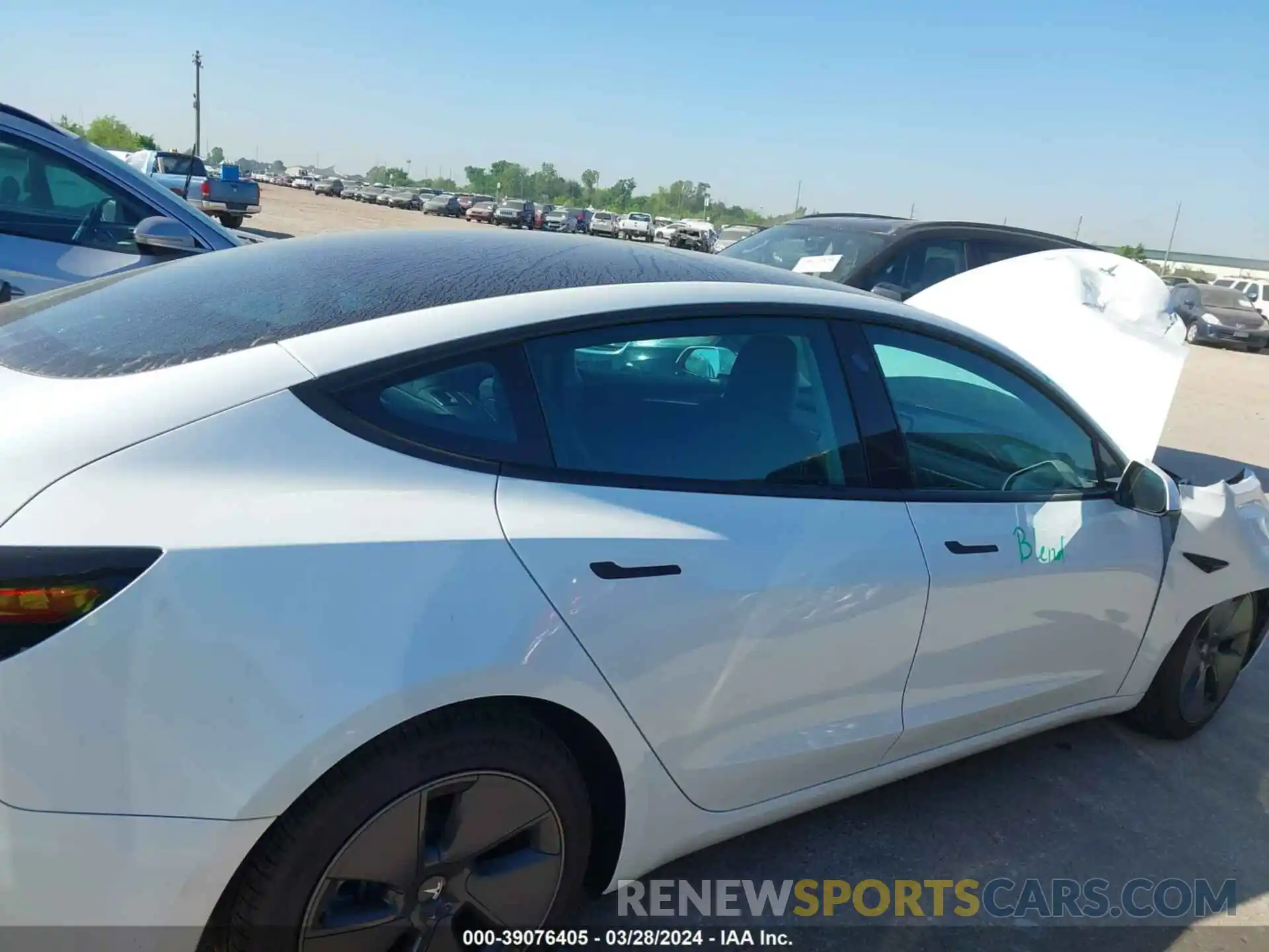 12 Photograph of a damaged car 5YJ3E1EA2PF492239 TESLA MODEL 3 2023